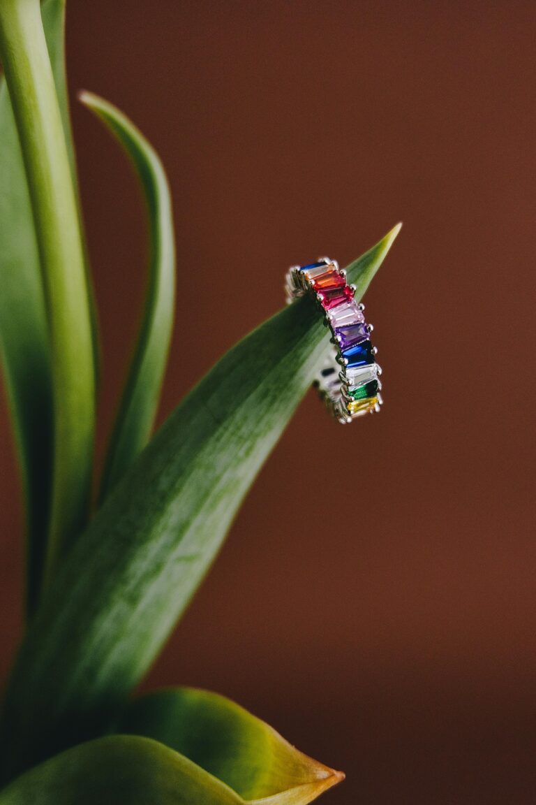 rainbow jewelry pride diamond ring colorful background